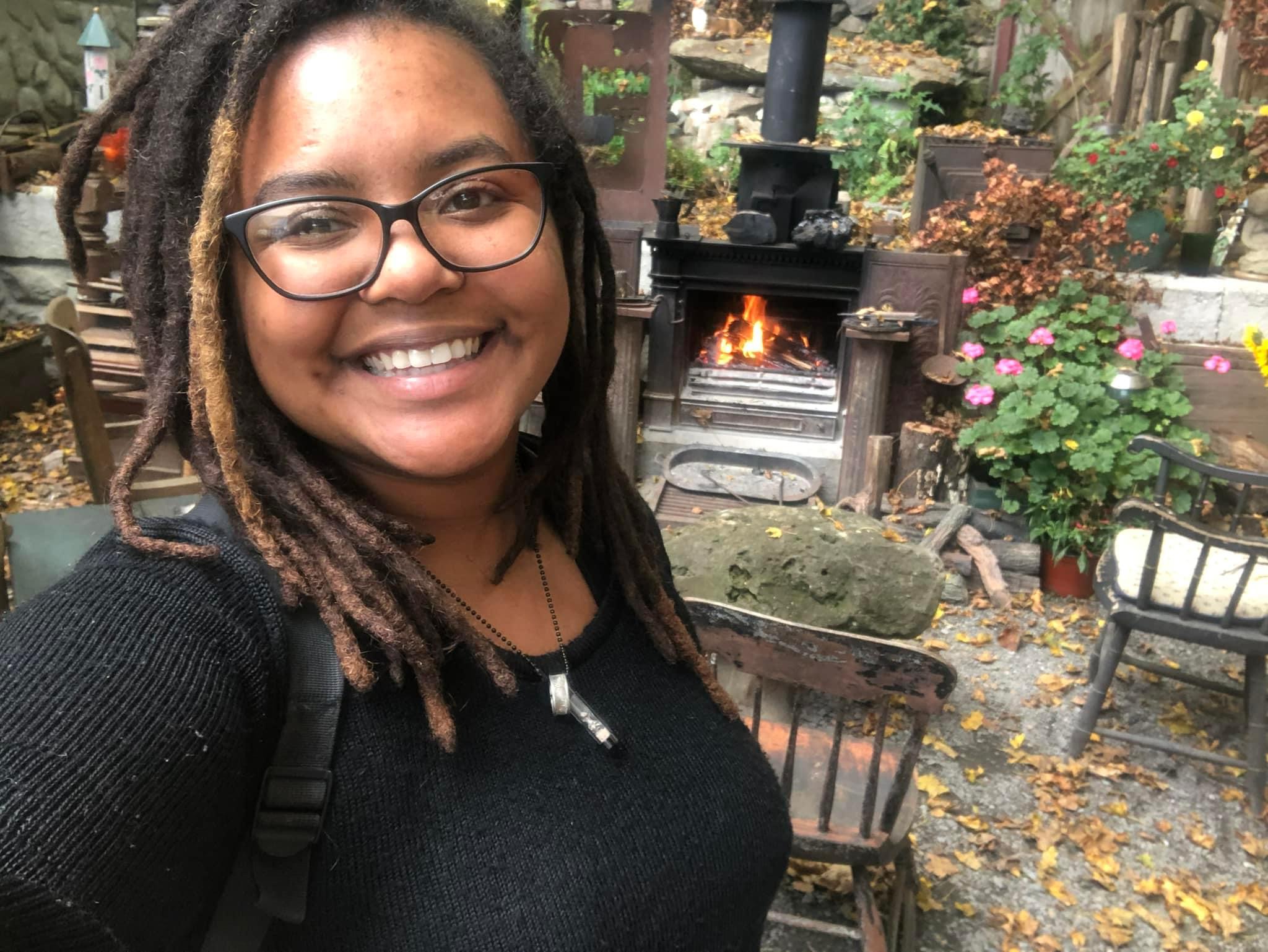 Young women posing in a backyard